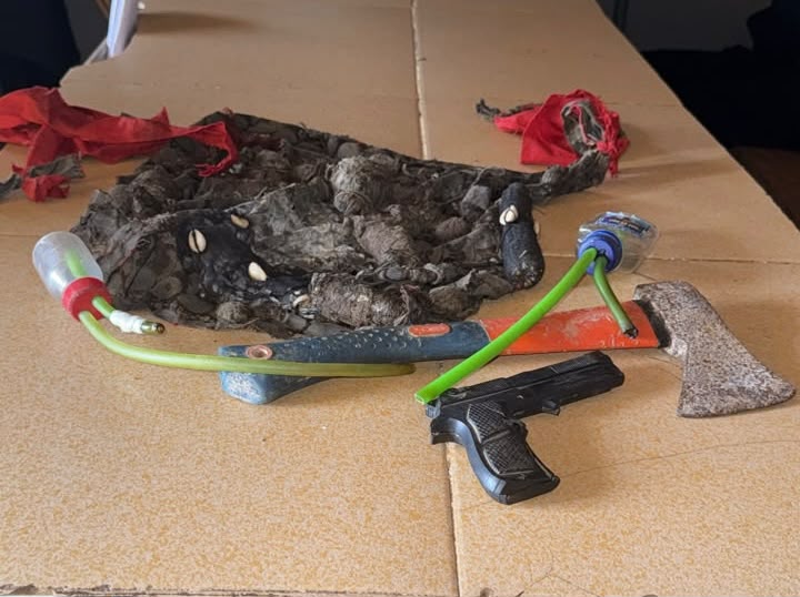 POLICE ARREST SUSPECTED CULTIST, RECOVER RUBBER-MADE PISTOL, AXE, CRIMINAL CHARMS AND ILLICIT DRUG